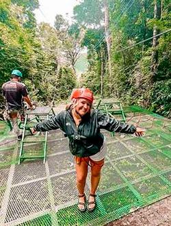 a student gets ready for a zipline in costa rica